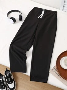 Pantalón largo casual tejido de niños preadolescentes con cintura con etiqueta y ajuste holgado - Negro - Ver 1