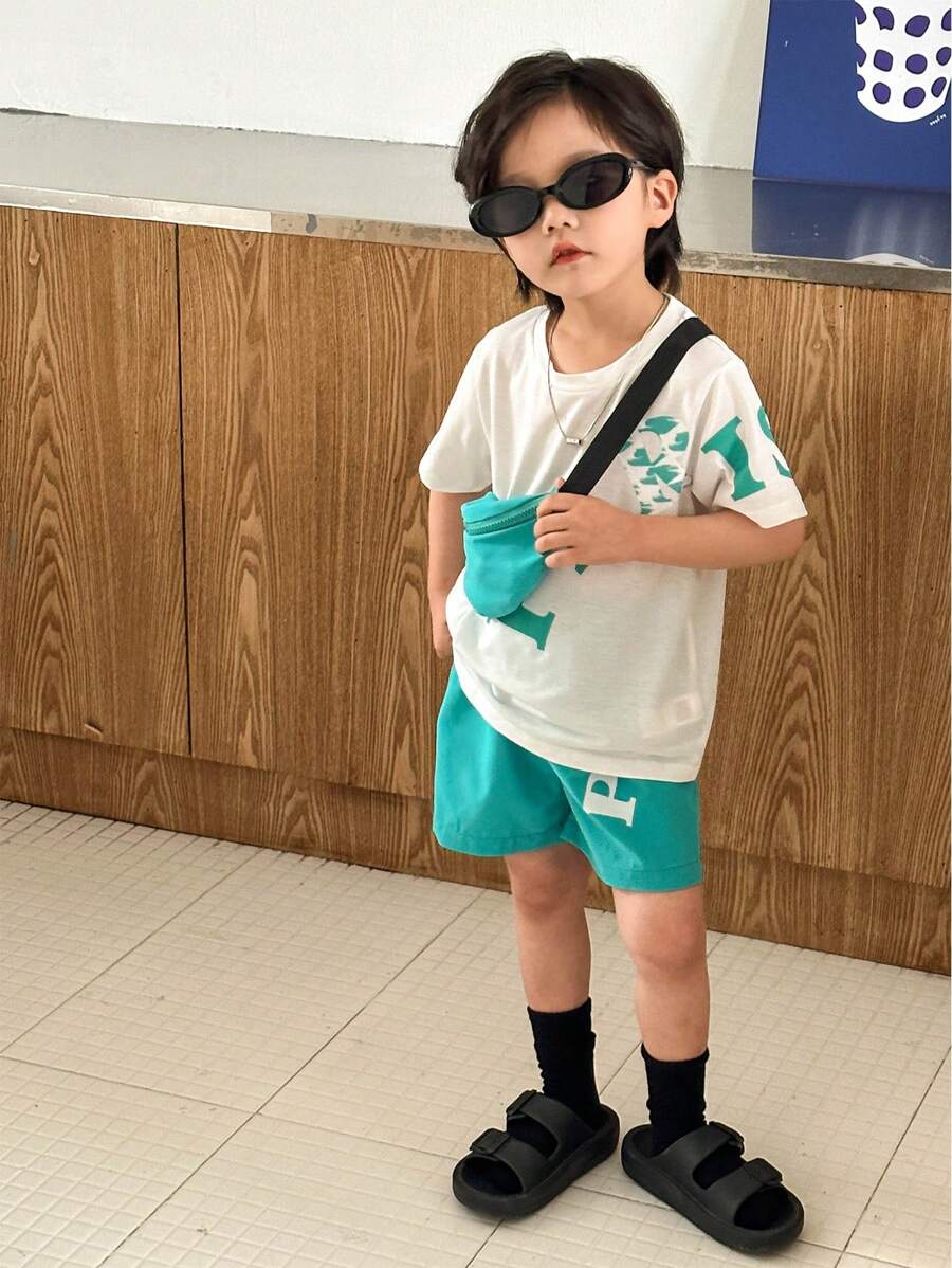 SHEIN 2pcs/Set Young Boy Casual Korean-Style Letter & Graphic Print Crew Neck T-Shirt And Matching Shorts With Pouch For Spring/Summer Wear - Multicolor - View 1
