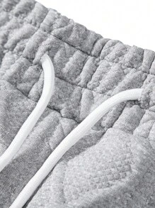 Manfinity Homme 男士度假休闲风，INS风短袖衬衫短裤套装，黑色底色，饰以向日葵提花和亮片设计，时尚百搭。弹性腰带提升穿着舒适度，尽显法式休闲浪漫风情。这套服装非常适合夏威夷海滩度假、音乐节以及日常穿着，是送给男友或老公的绝佳礼物。男士短袖衬衫套装，时尚夏季之选，男士短裤套装，男士两件套，男士短裤两件套 - 灰色 - 查看 5