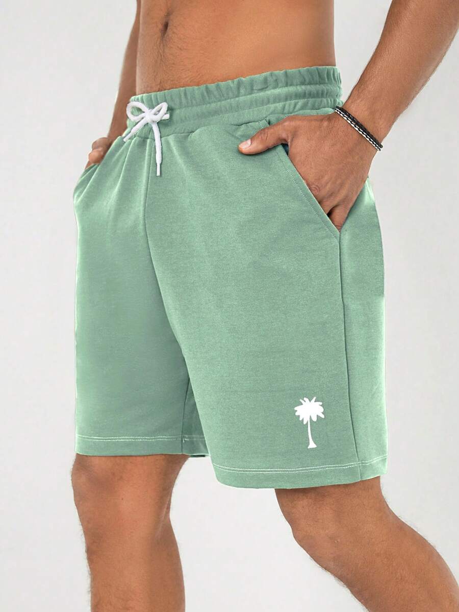 RueChic Shorts de cintura ajustable con cordón estampado de árboles de coco para hombre, ideales para deporte, vacaciones y uso casual en verano - verde menta - Ver 1