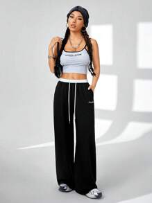 Coolane Women's Solid Color Patchwork Front Tie Pocket Casual Pants, For Daily Wear - Black and White - View 5