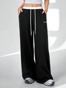 Coolane Women's Solid Color Patchwork Front Tie Pocket Casual Pants, For Daily Wear - Black and White - View 4