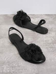 SHUZIA Sandalias planas para mujeres en unicolor con decoración de flores 3D - Negro - Ver 2