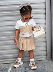 SHEIN Conjunto casual con estilo de vacaciones para bebé niña que incluye top de manga corta color bloque y falda plisada