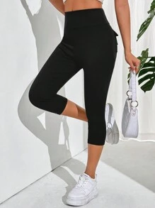 SHEIN Essnce Leggings pour femmes décontractés à taille large et poches retournées de couleur unie