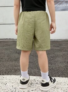 SHEIN Kleine Jungen Schnelltrocknende Shorts aus Gewebe mit Tasche, geeignet für Sommerausflüge