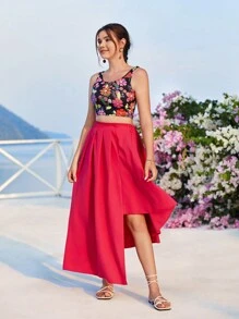 Teenager Mädchen elegantes Set aus Blumen bedrucktem Trägertop und asymmetrischem Saum Rock, Sommer