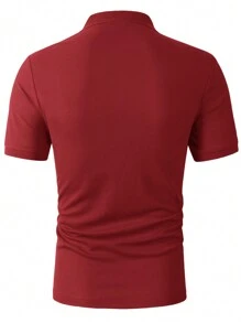 Manfinity Homme Effen herenpoloshirt met enkele rij knopen en korte mouwen, zomer