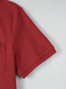 Manfinity Homme Effen herenpoloshirt met enkele rij knopen en korte mouwen, zomer