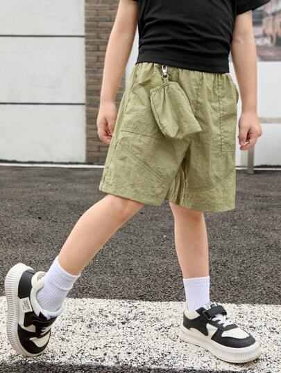 SHEIN Young Boy Quick Dry Fabric Shorts With Pouch, Suitable For Summer Outings