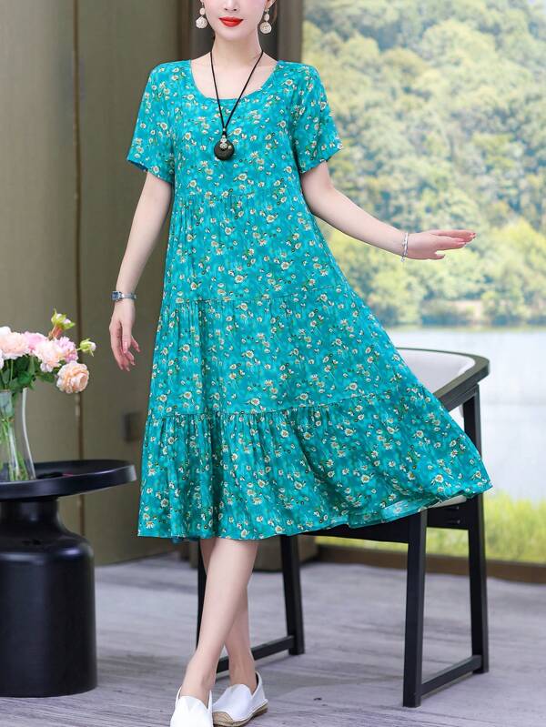 Nuovo vestito casual stampato allentato a metà lunghezza per le donne