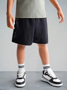 SHEIN Tween Boy Knit Solid Color Letter Print Design Drawstring Shorts With Pockets