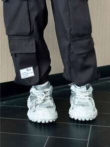 SHEIN 年輕男孩時尚休閒運動褲，配有大口袋和褶邊帶