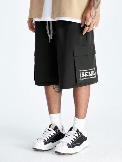 Manfinity RebelGame Pantalones cortos de carga sueltos para hombre con cintura con cordón y estampado de letras con bolsillos