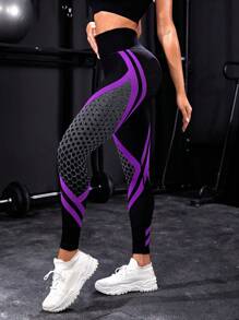 SHEIN Sport Studio Leggings deportivos de cintura alta con estampado de colores contrastantes