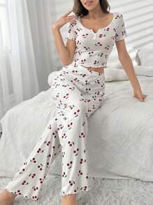 Conjunto de pijama blanco con top de manga corta con escote en pico con bordado de encaje y estampado de cerezas, y pantalón largo para mujer