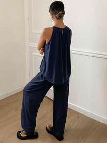 Livesso Conjunto de ropa de hogar femenina con parte superior de pliegues simples sin mangas y pantalones en un solo color