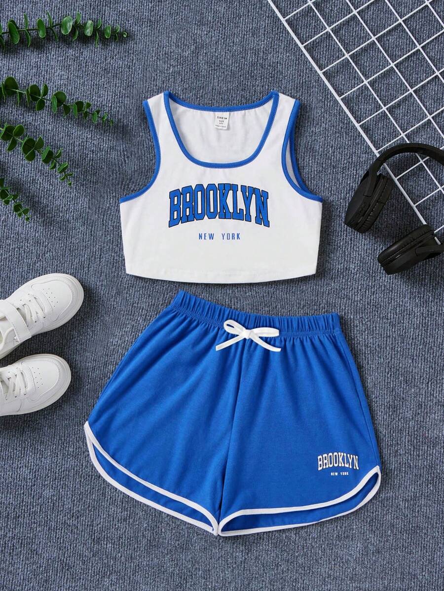 SHEIN Conjunto casual de dos piezas para niña preadolescente con top corto de punto de color sólido con estampado de letra y shorts - azul real - Ver 1