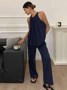 Livesso Conjunto de ropa de hogar femenina con parte superior de pliegues simples sin mangas y pantalones en un solo color