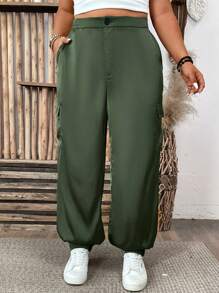 Plus Size Solid Color Drawstring Waist Casual Tapered Pants With Pockets