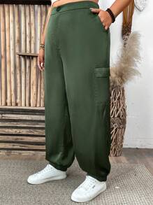 Plus Size Solid Color Drawstring Waist Casual Tapered Pants With Pockets