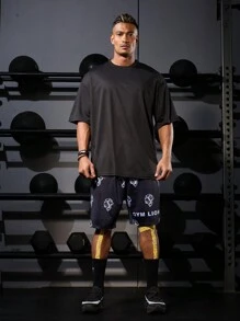 Manfinity Sport PWRUP Boyfriend Style Men's Drawstring Lion Printed Casual Sports Shorts Jogger Shorts