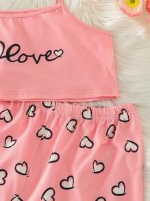 Conjunto de pijama casual simples para meninas adolescentes, com regata e shorts estampados com corações.