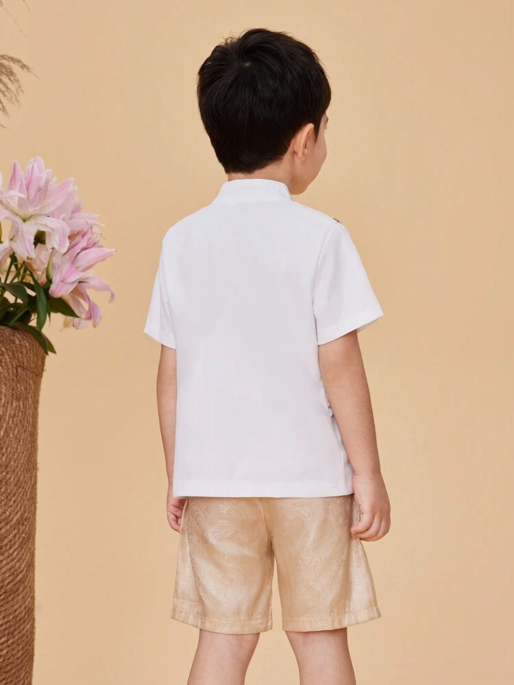 少年スーツ2点セット、おしゃれでカジュアルなジェントルマンウォイトシャツ、バウノット付きアプリコット色のベスト、ペイズリー柄のカジュアルショートパンツ、パーティーや屋外のイベントに最適