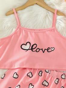 Conjunto de pijama casual simples para meninas adolescentes, com regata e shorts estampados com corações.