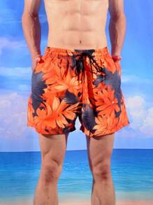 Manfinity Bermudas de playa holgadas para hombre con estampado de plantas tropicales y cintura elástica con cordón, vacación