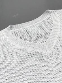 Haut en maille ample pour femmes avec fente à l'ourlet et col rond pour le printemps/été