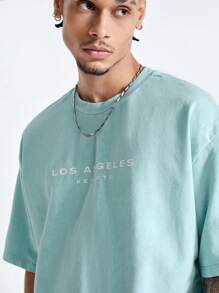 Manfinity VCAY Camiseta de tejido de punto de manga corta y corte holgado para hombre con estampado en inglés, ideal para verano - Celeste - Ver 3