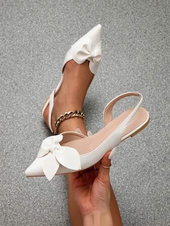 2025 秋冬夏季新款女士时尚平底鞋，尖头蝴蝶结一脚蹬，粉色