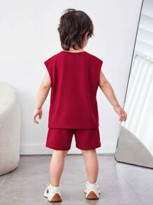 SHEIN Young Boy Casual Korean Style Animal Letter Print Sleeveless Top & Solid Color Knitted Shorts With Pockets Two-Piece Set