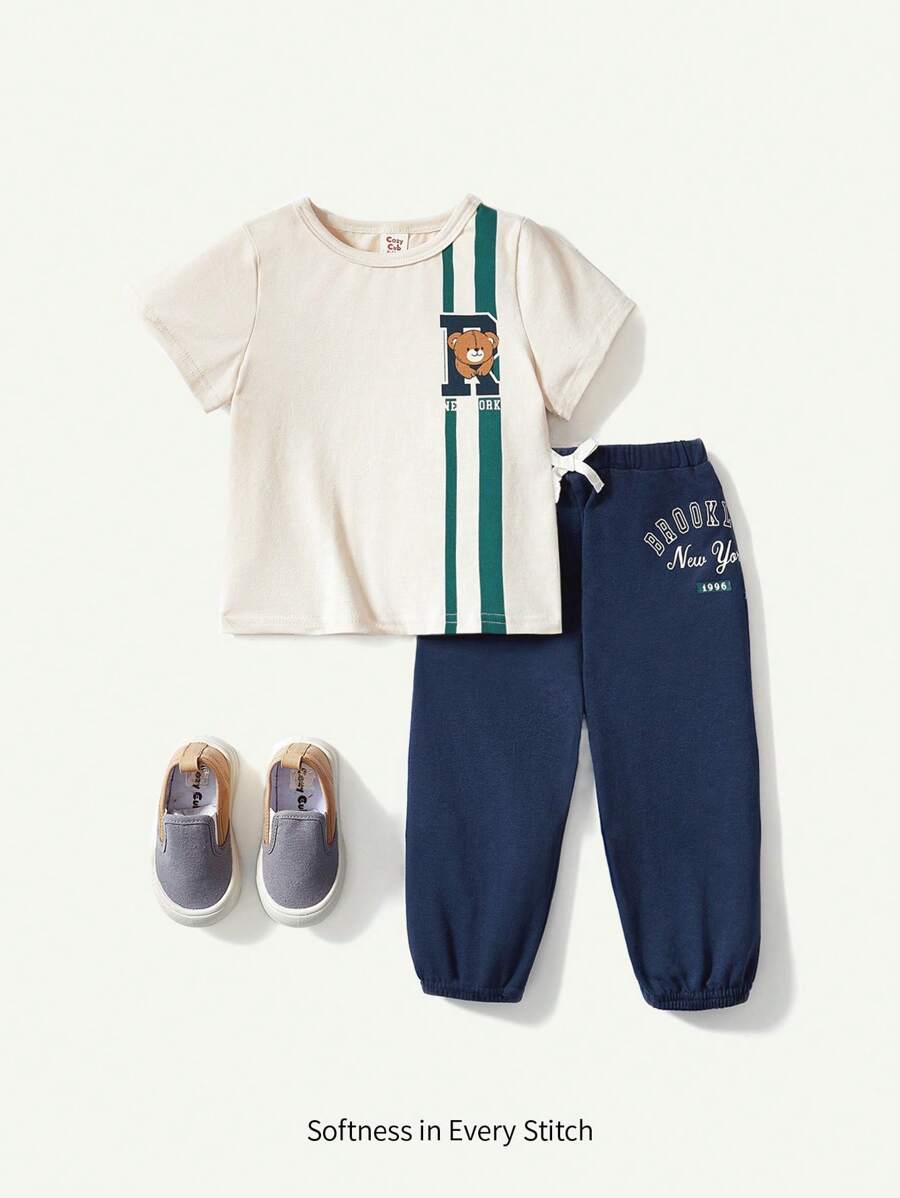 Cozy Pixies Baby Boy Cartoon Printed Short Sleeve Pullover Tops & Tapered Pants Set - Blue - View 1