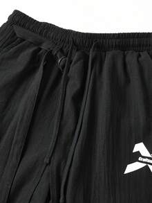 Manfinity EMRG Pantalones casuales para hombre con diseño de corte asimétrico a la moda - Negro - Ver 6