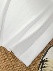 Manfinity LEGND Camiseta casual de verano para hombre con cuello redondo de manga corta y estampado de cara de dibujos animados con letra impresa