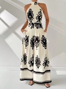 Firerie Mono de pierna ancha con estilo vacacional para mujer con impresión en toda la pieza, cuello halter y bolsillos inclinados para el verano