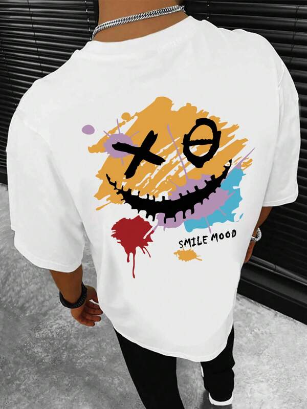 Manfinity LEGND Camiseta casual de verano para hombre con cuello redondo de manga corta y estampado de cara de dibujos animados con letra impresa