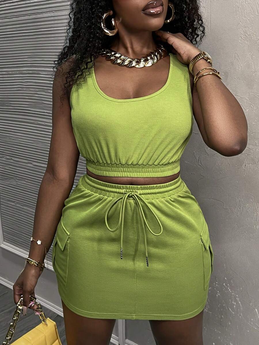 Slaydiva مجموعة تنورة بجيوب العمل الخاصة و قميص بلا أكمام و عنق دائري غير رسمي و جديد بأسلوب الشارع - زد - أخضر - مشاهدة 1
