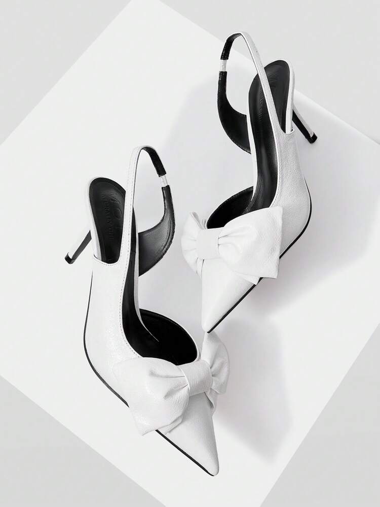 Zapatos de mujer con puntera afilada y tacón de aguja metálicos con decoración de lazo