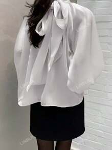 Elegante blusa suelta de manga larga con cuello alto y manga de globo en unicolor para mujer, ideal para primavera y otoño