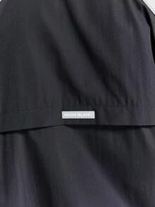 Manfinity VCAY Veste coupe-vent de créateur avec blocs de couleurs et passepoil réfléchissant