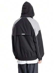 Manfinity VCAY Veste coupe-vent de créateur avec blocs de couleurs et passepoil réfléchissant