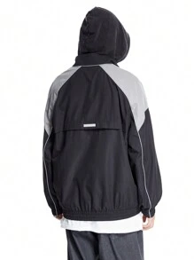 Manfinity VCAY Veste coupe-vent de créateur avec blocs de couleurs et passepoil réfléchissant