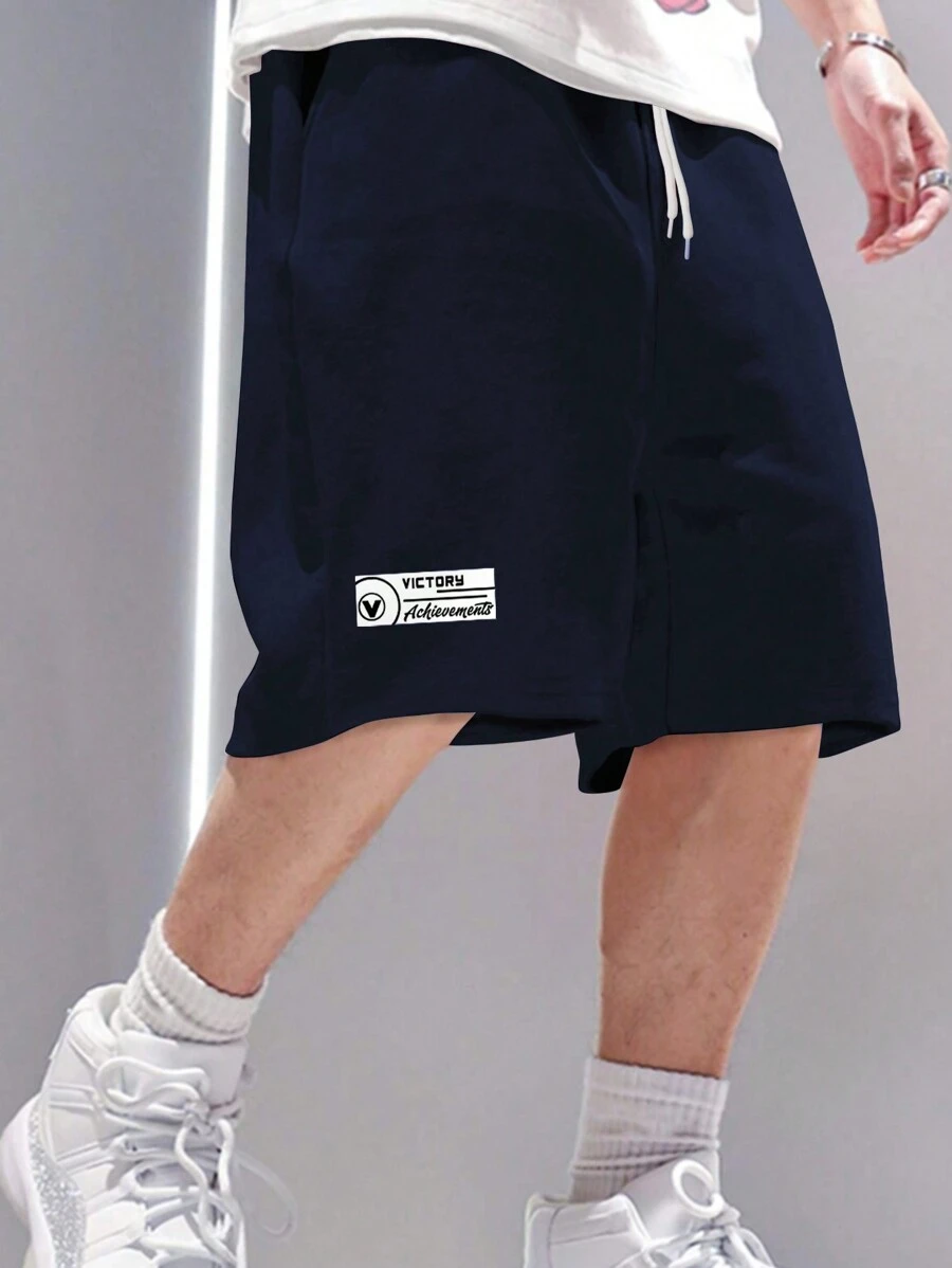 Manfinity Hypemode Quần short thông thường có dây rút chắp vá màu trơn cho nam cỡ lớn cho mùa hè - Màu xanh hải quân - Xem 1