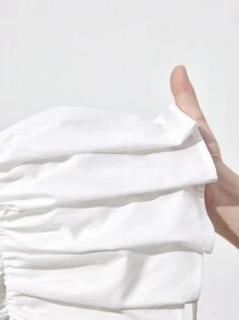 Maija Blusa corta de mujer con cintura plisada y ceñida, diseño elegante y minimalista apta para graduaciones, volver al colegio o fiestas, primavera-verano-inicio de otoño 2025