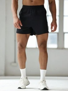 Manfinity Sport Corelite Boyfriend-Stil Herren Grafik Muster Elastische Taille Spalt Saum Sport Shorts, Sommer Schule