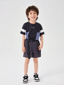 SHEIN Ensemble de haut à manches courtes à col rond pour garçon avec blocs de couleurs imprimés de lettres et short unicolore avec poche, tenues décontractées d'été