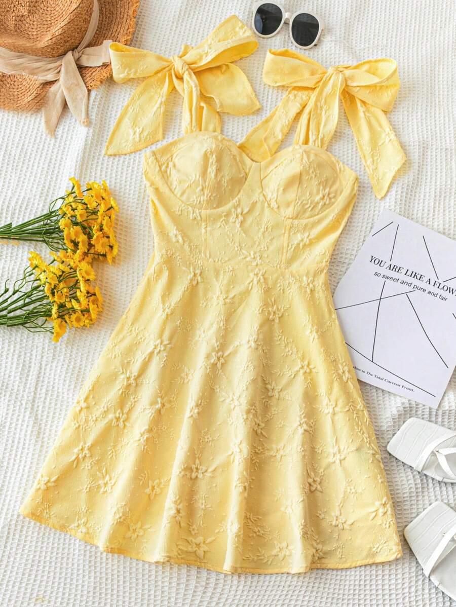 Soleia Váy mùa hè vải hoa nhỏ có dây đeo vai trang trí nơ cho nữ, họa tiết bèo nhún, màu vàng kem, thích hợp cho bãi biển, lễ hội âm nhạc, đám cưới theo phong cách Boho và các dịp mùa hè - Màu vàng - Xem 1